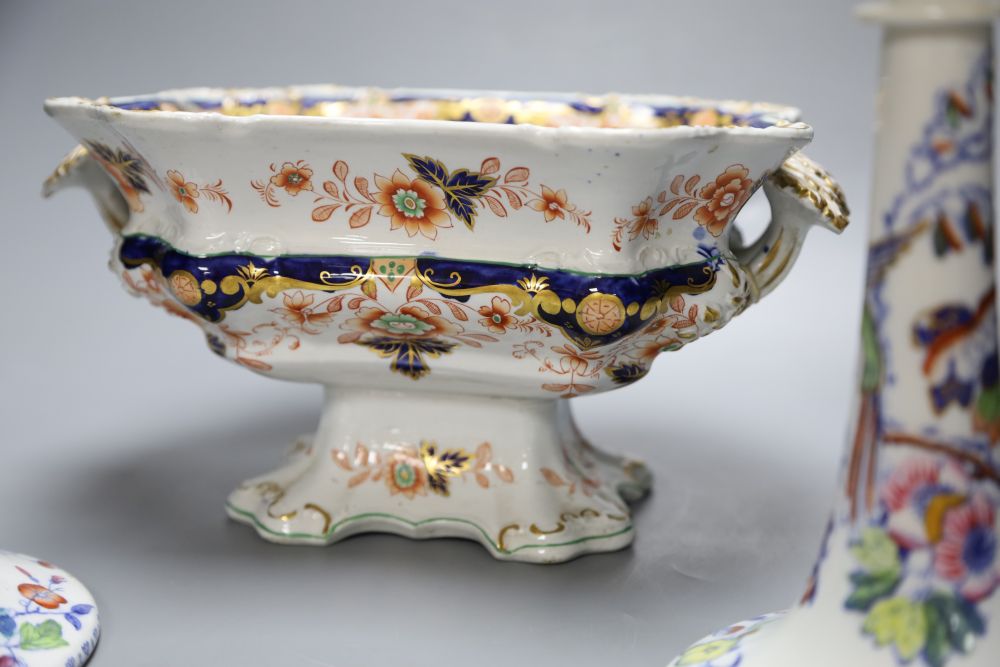 A pair of Masons Ironstone Flying Bird pattern candlesticks and a 19th century Imari pattern tureen (a.f.)